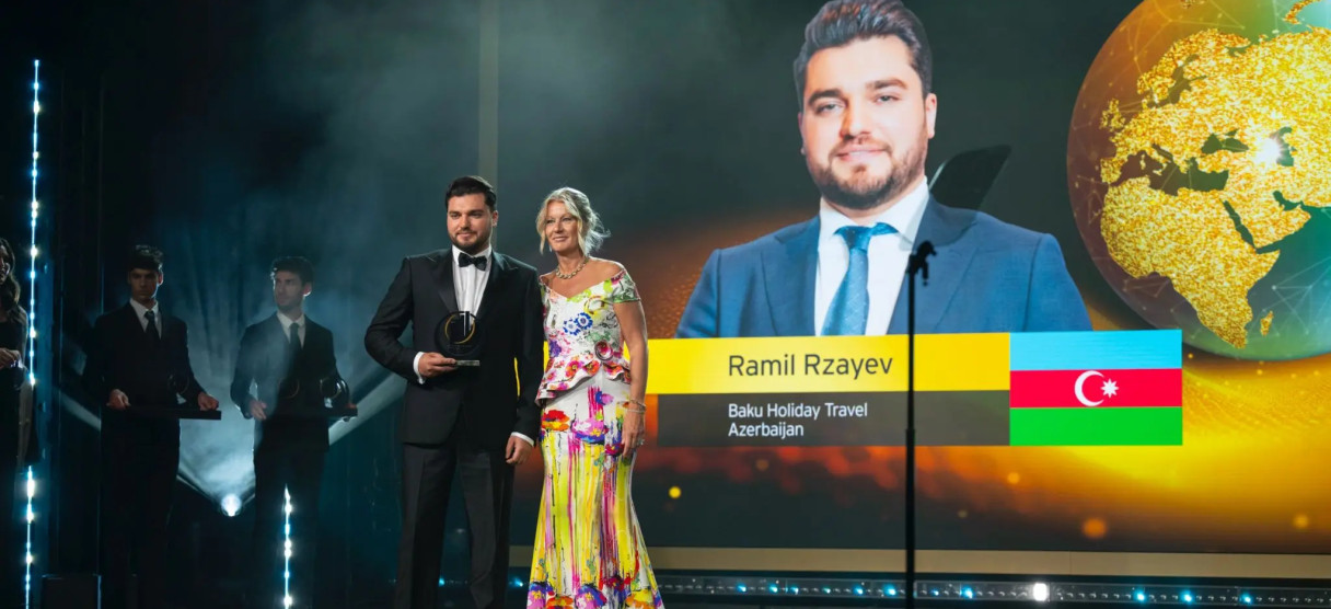 Cover for the award that Mr Rzayev won at EY
