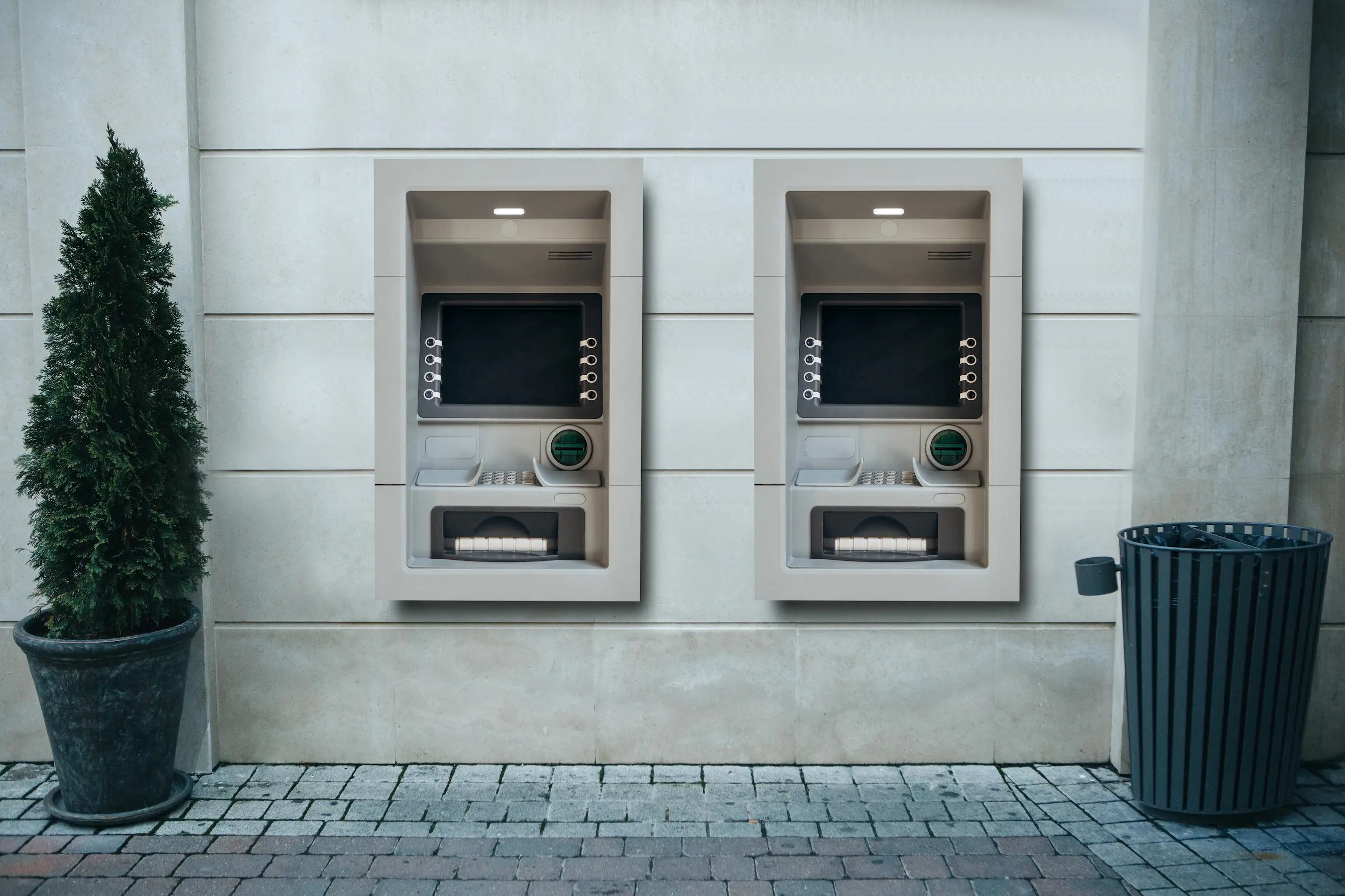 Two ATMs side by side for currency exchange in Baku.