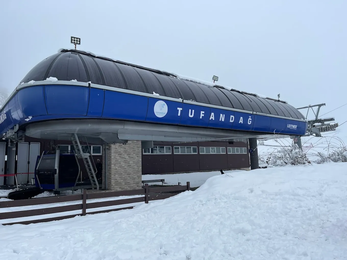 The Gabala Cable Car station at Tufandag Resort stands covered in snow, offering winter transport to the mountain’s ski slopes.