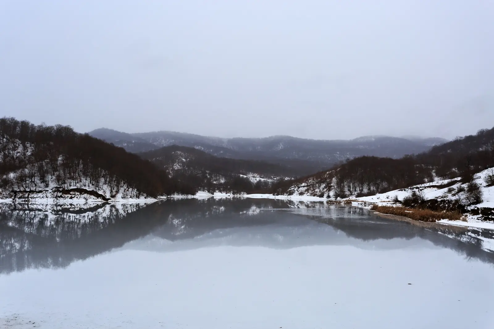 Frozen waters of Lake Chanlibel in Quba, Azerbaijan, in winter.