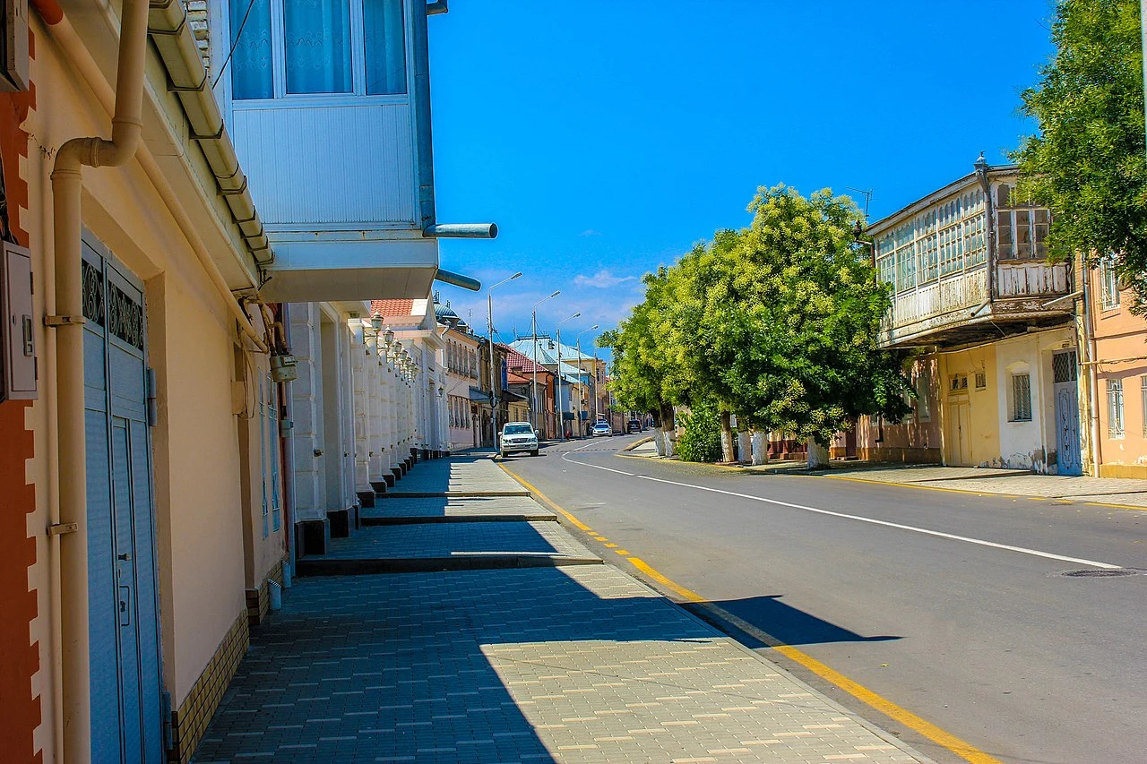 A beautiful street in the Red Town of Quba, which consists of colorful entrance doors.